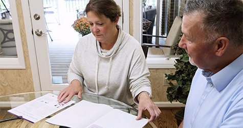 Illinois Mutual agent Dale Cecil meeting with one of his clients