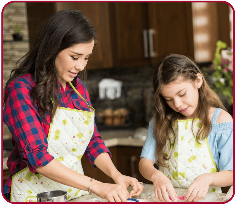 Young small business owners looking at notes