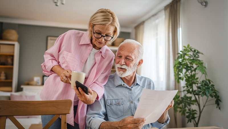 debt-coverage woman looking over her finances