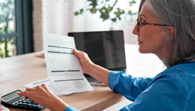 woman looking over her finances