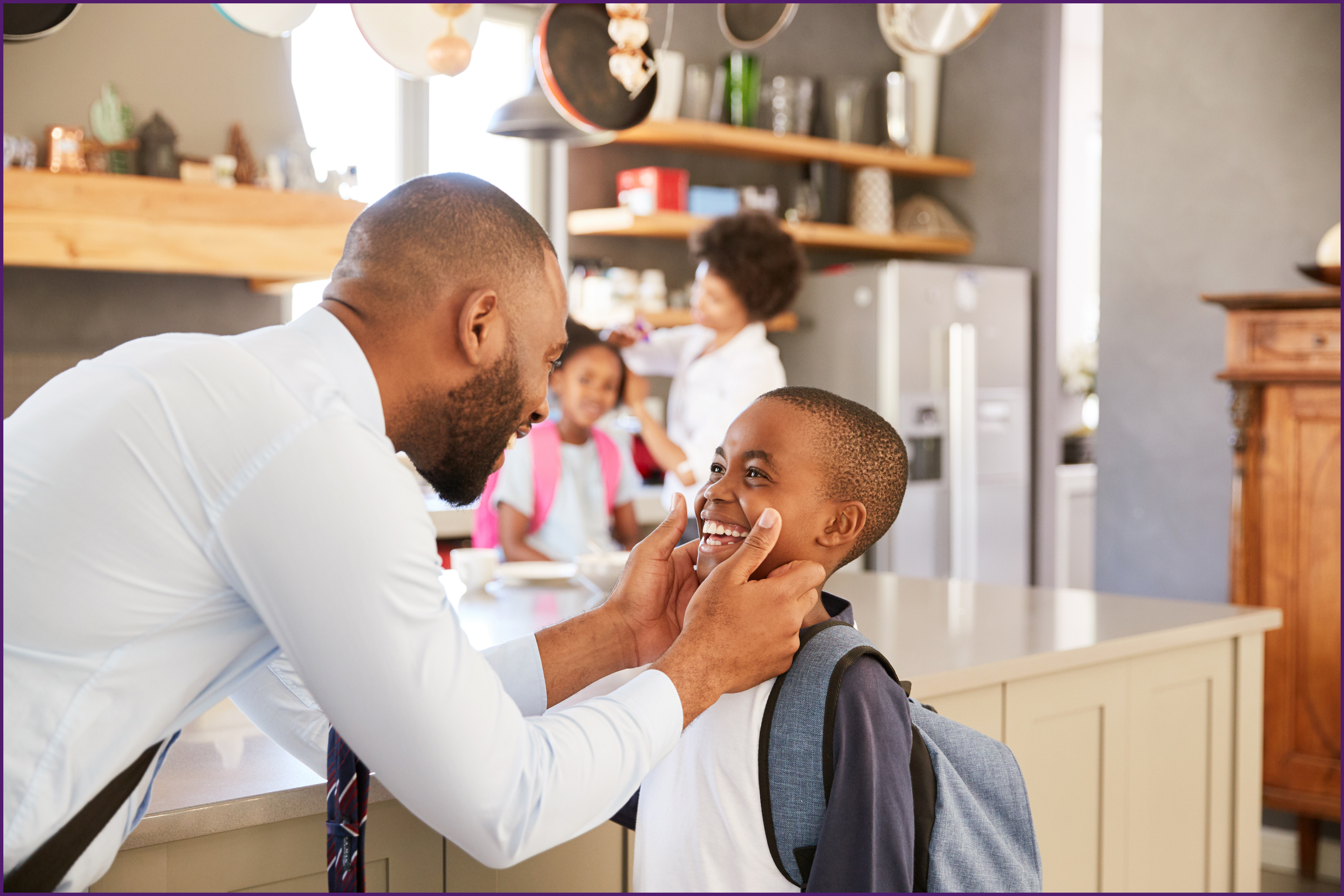 dream-protector-2-ol image of a father talking with his son before school
