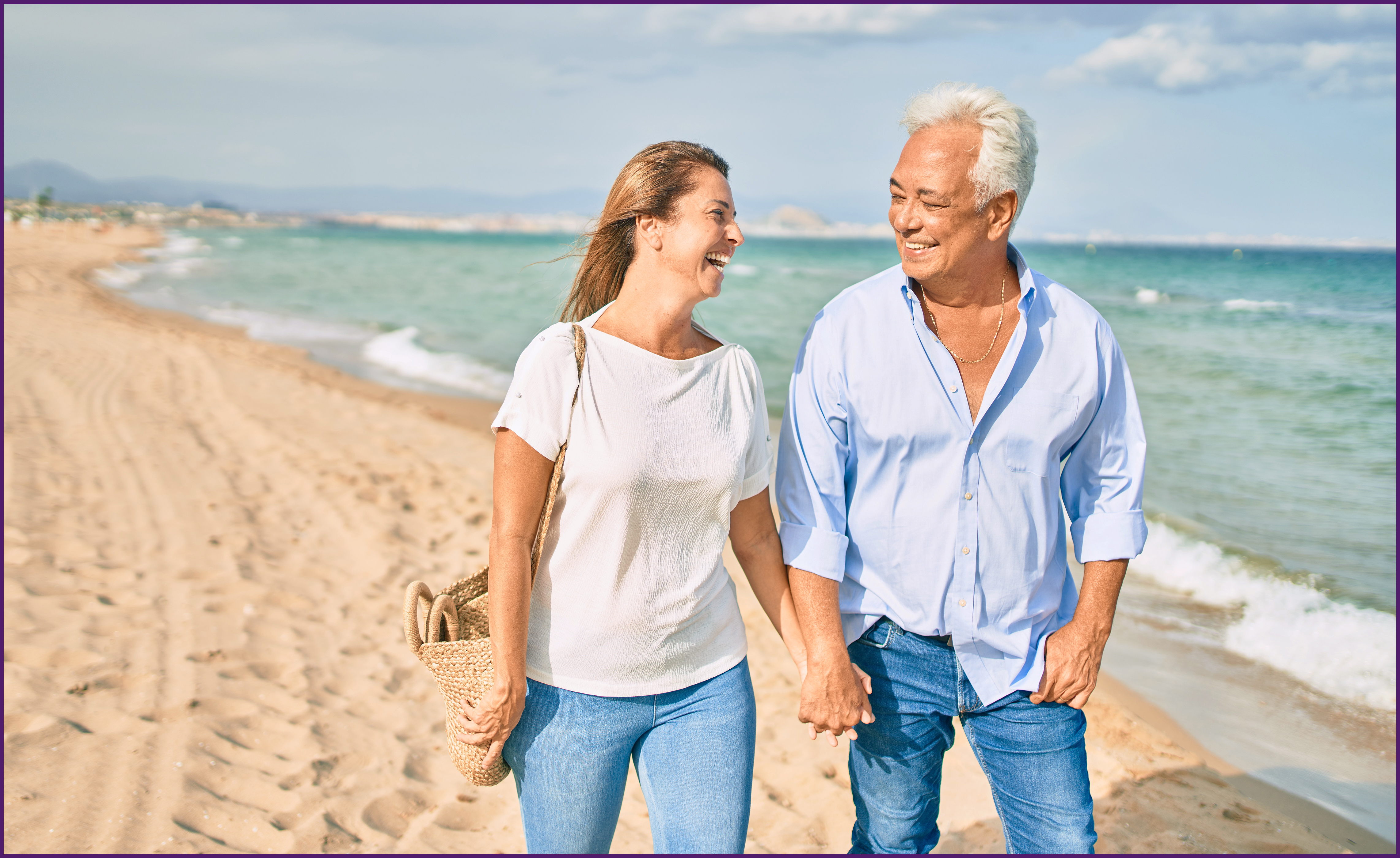 empty-nester-2-ol image of a couple walking along the beach