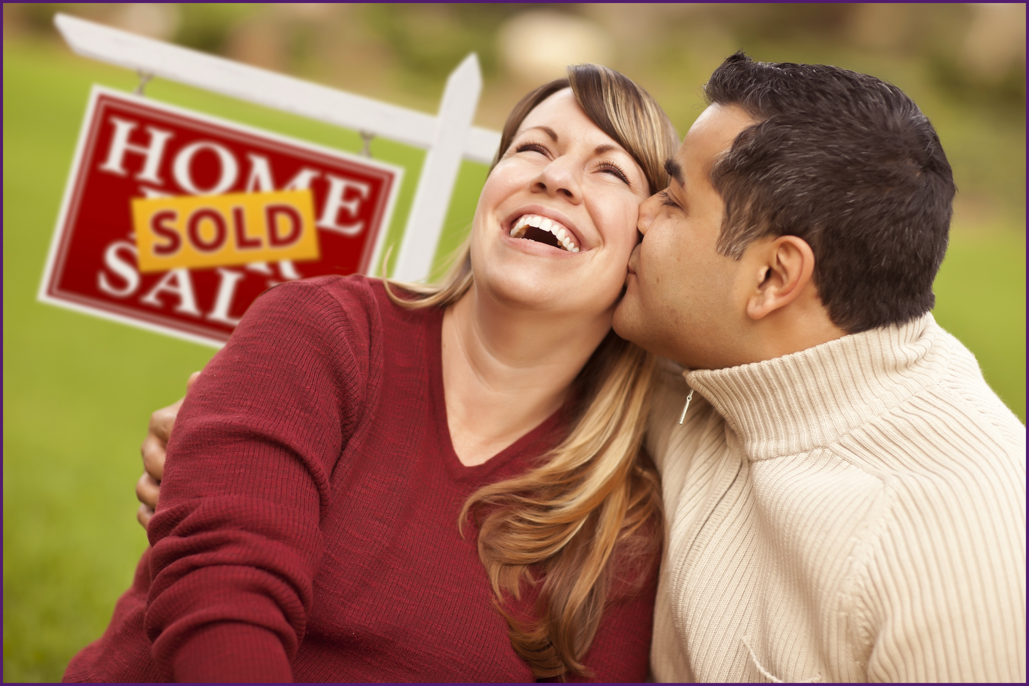 new-homeowner-1-ol image of a couple in front of a sold sign