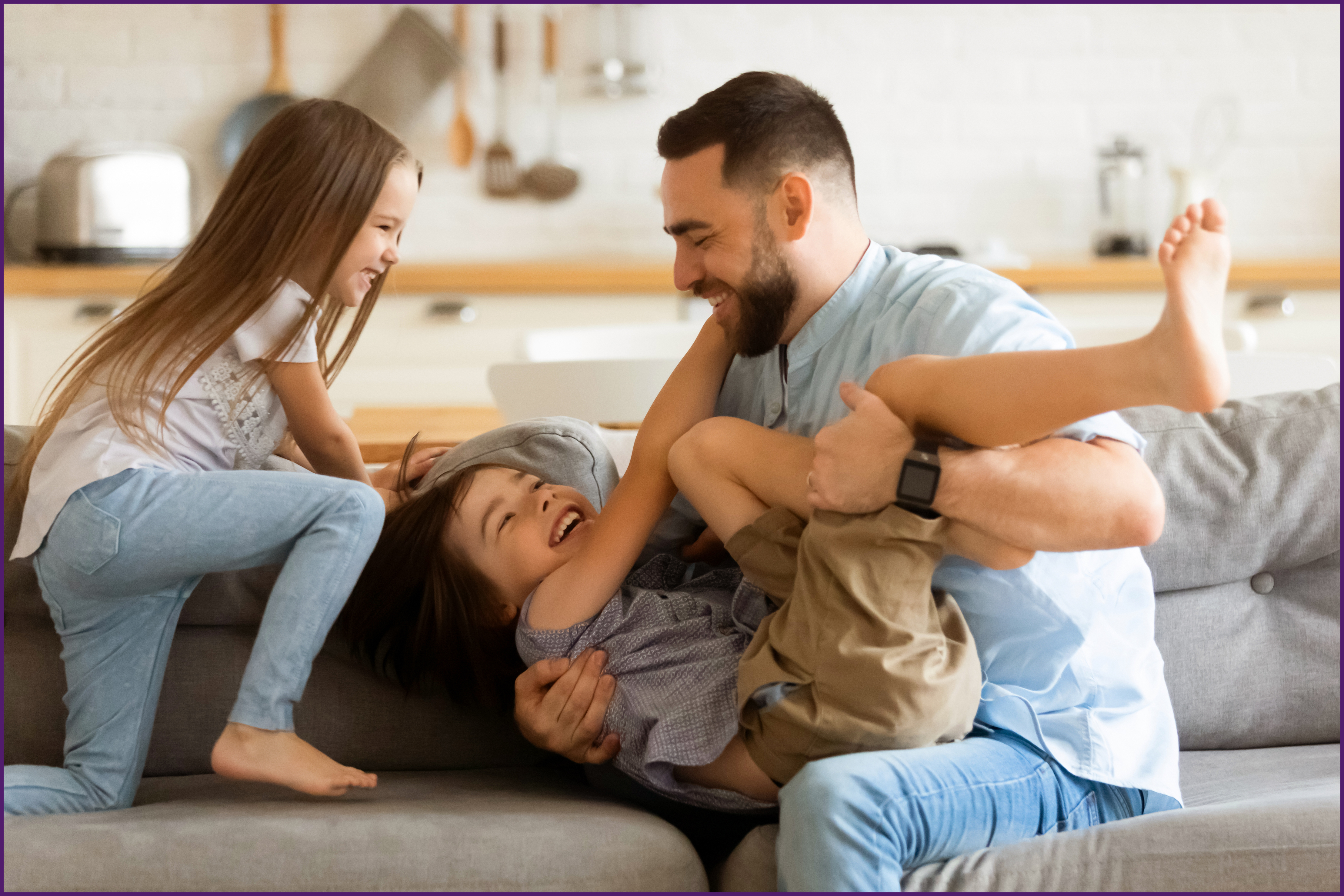 recently-divorced-3-oljpg image of a father on the couch with his children