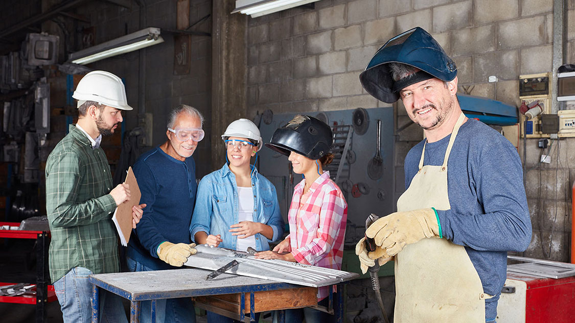 blue collar workers interacting together