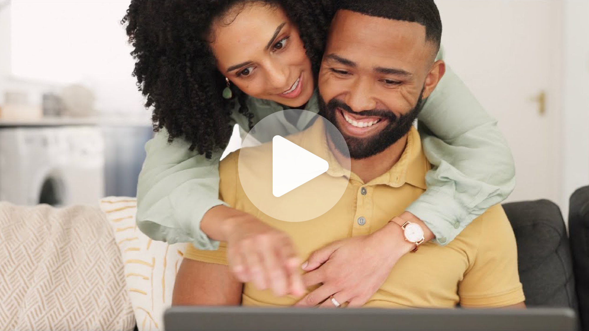 video thumbnail image of a husband and wife looking at a laptop screen