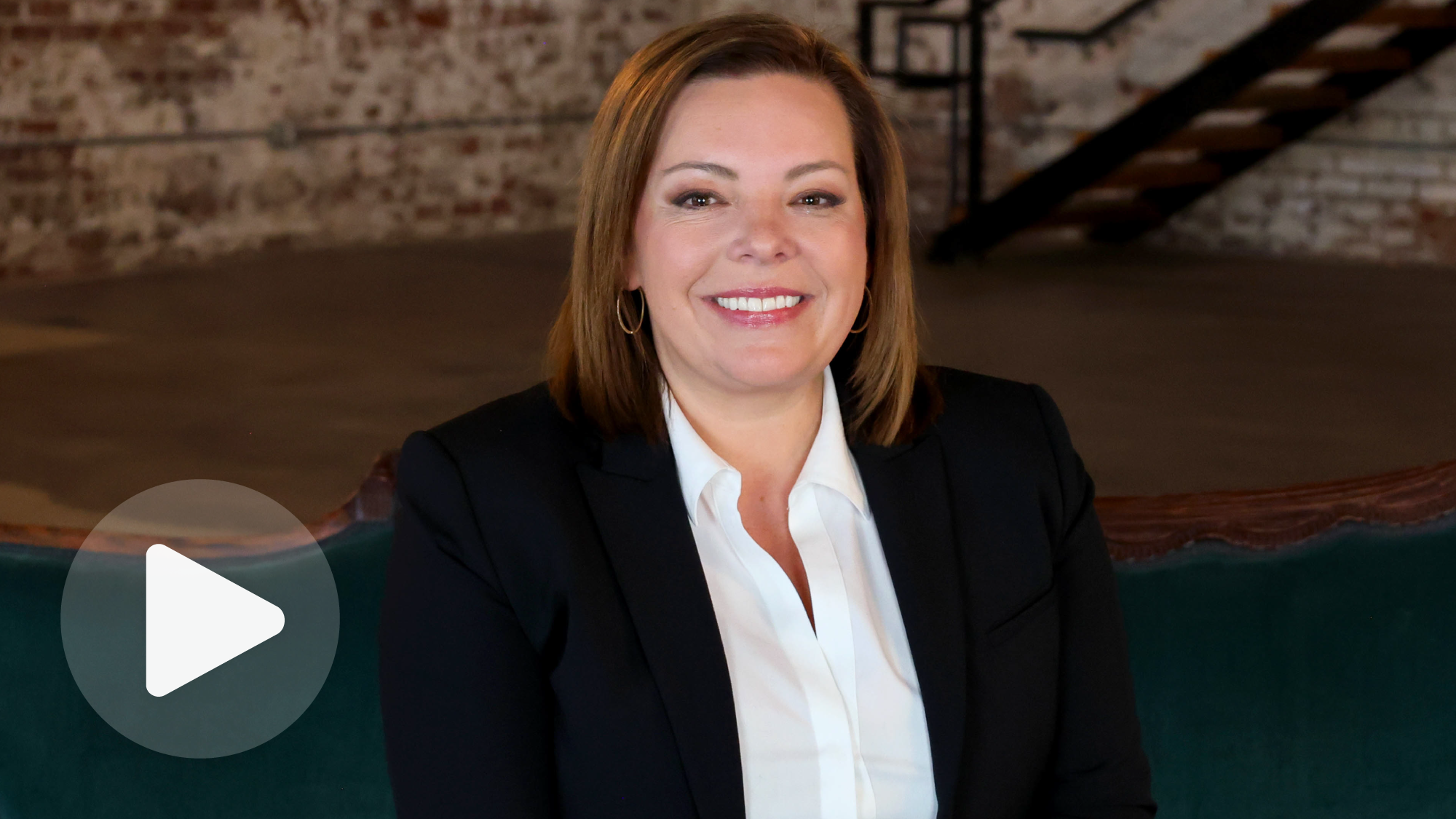 video thumbnail image with a play button and a photo of Katie McCord Jenkins